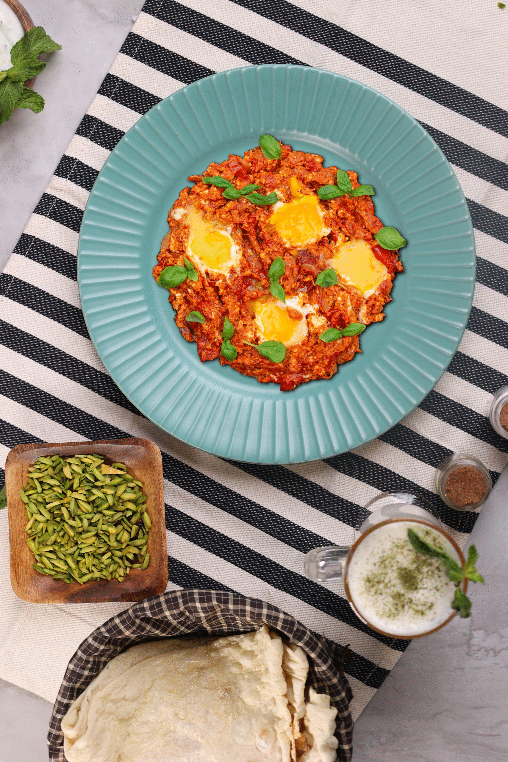 Traditional Iranian-style egg and sausage dish served fresh at Layali Al Rabee, the Best Iranian Restaurant in Abu Dhabi.