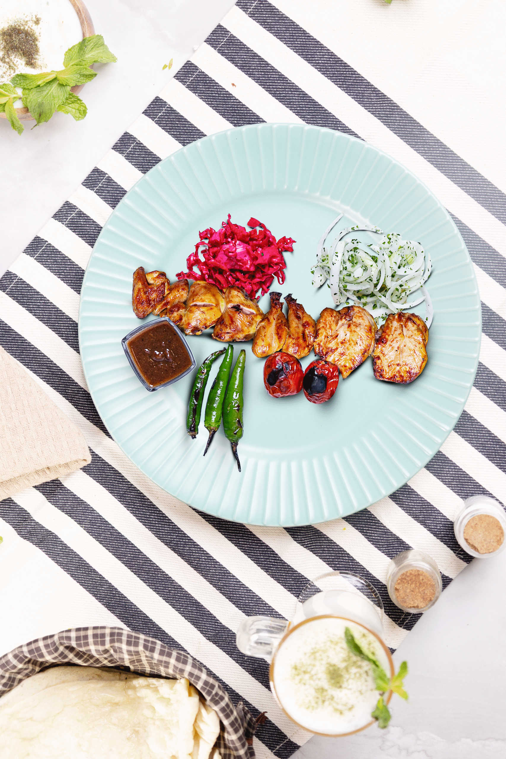 Succulent grilled chicken wings and shoulders served hot at Layali Al Rabee, the Best Iranian Restaurant in Abu Dhabi.