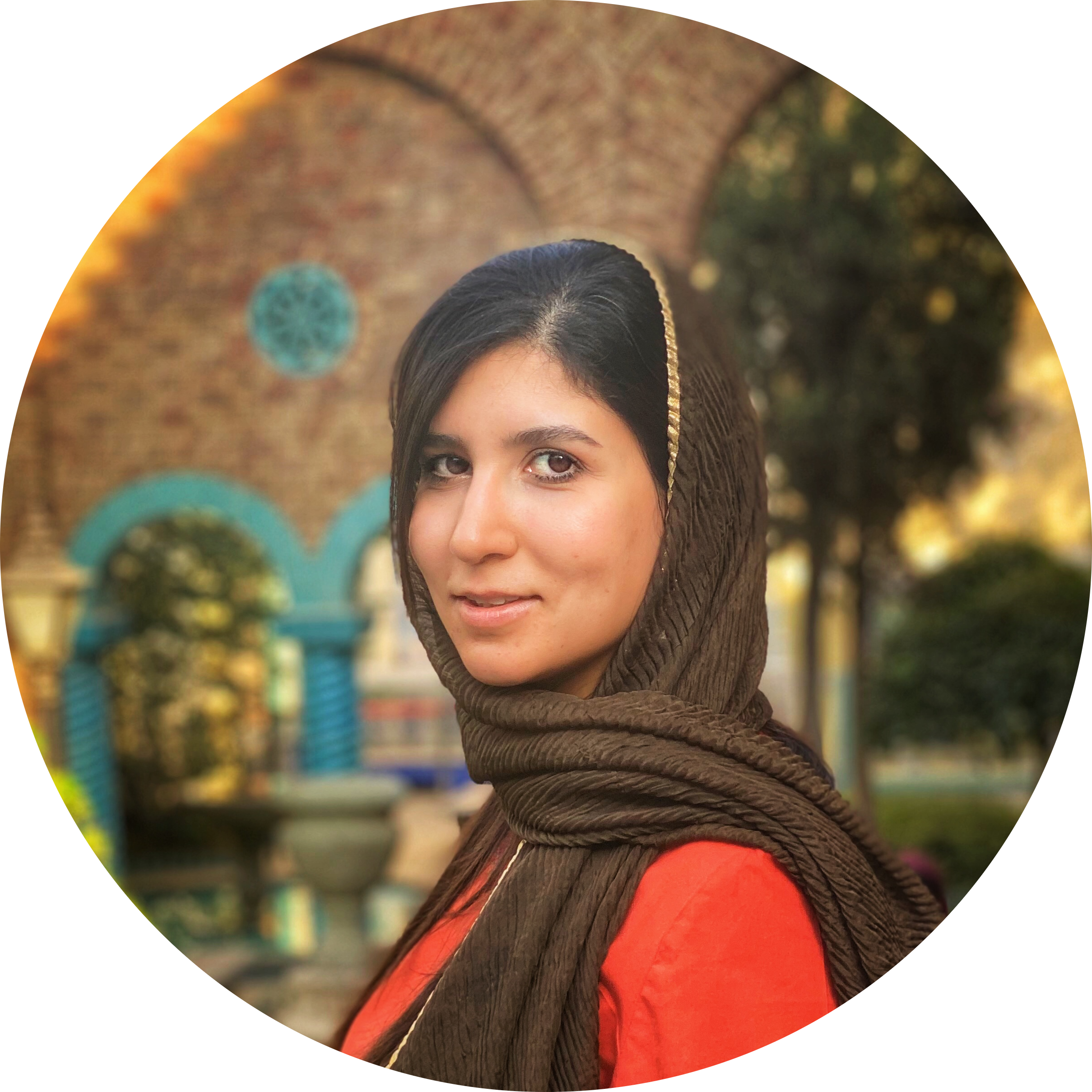 Female customer smiling after enjoying traditional Iranian food at Layali Al Rabee, featured in the customer review section.